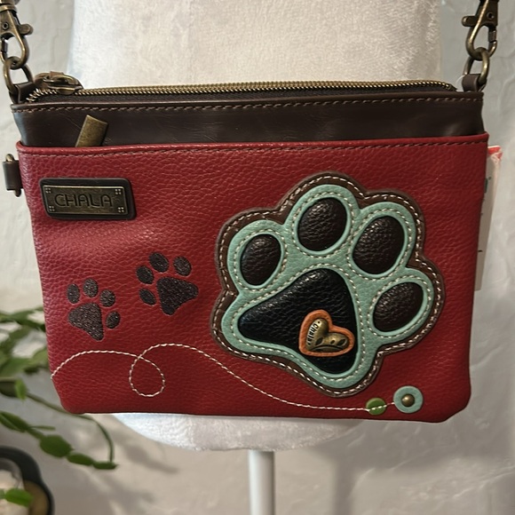 Chala Crossbody
Red Crossbody Bag with Paw Print Design
New with Tags - Picture 2 of 4